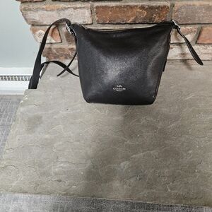 Coach black duffle bag. In good condition. Very spacious Crossbody bag.